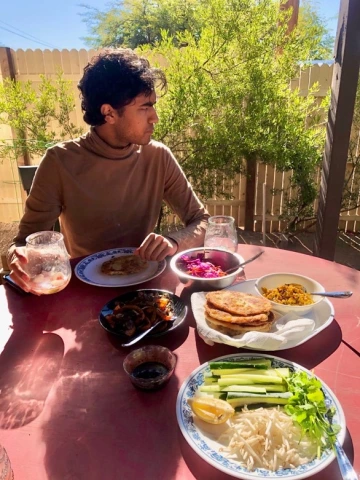 Photograph of Kunal eating a meal in Tucson, AZ